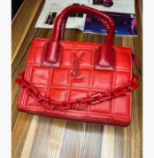 Red YSL medium sized bag with rubber chain across